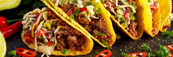 mexican-food-delicious-taco-shells-ground-beef-home-made-salsa-77872135