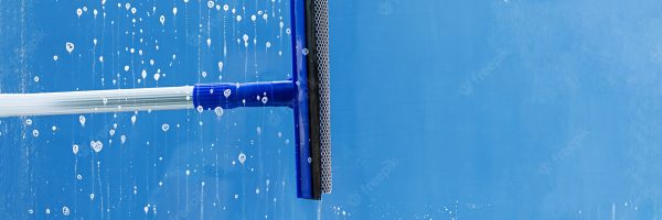 rubber-squeegee-cleans-window-clears-stripe-soaped-window-cleaning-service-concept_126783-449